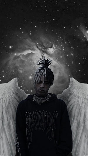 XXXTentacion with angel wings against a starry cosmic nebula background HD phone wallpaper