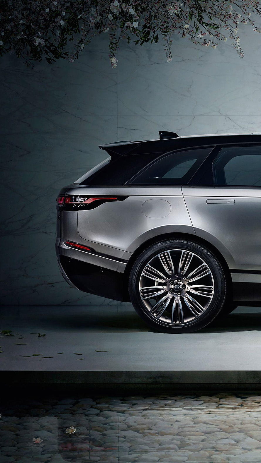 Silver Range Rover Velar Rear Quarter View with Chrome Wheels and Cherry Blossoms HD phone wallpaper