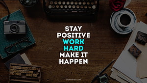 Motivational Quote on Vintage Desk with Typewriter and Camera HD wallpaper