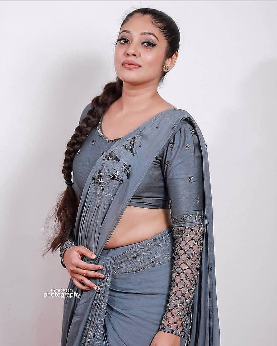 Veena Nandakumar in Elegant Grey Saree with Intricate Embroidery and Long Braid HD phone wallpaper