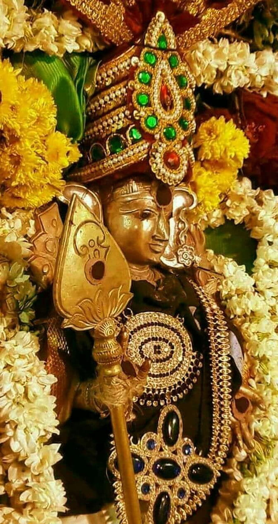 Ornate Murugan Deity Statue Adorned With Marigold Garlands And Gold Jewelry HD phone wallpaper