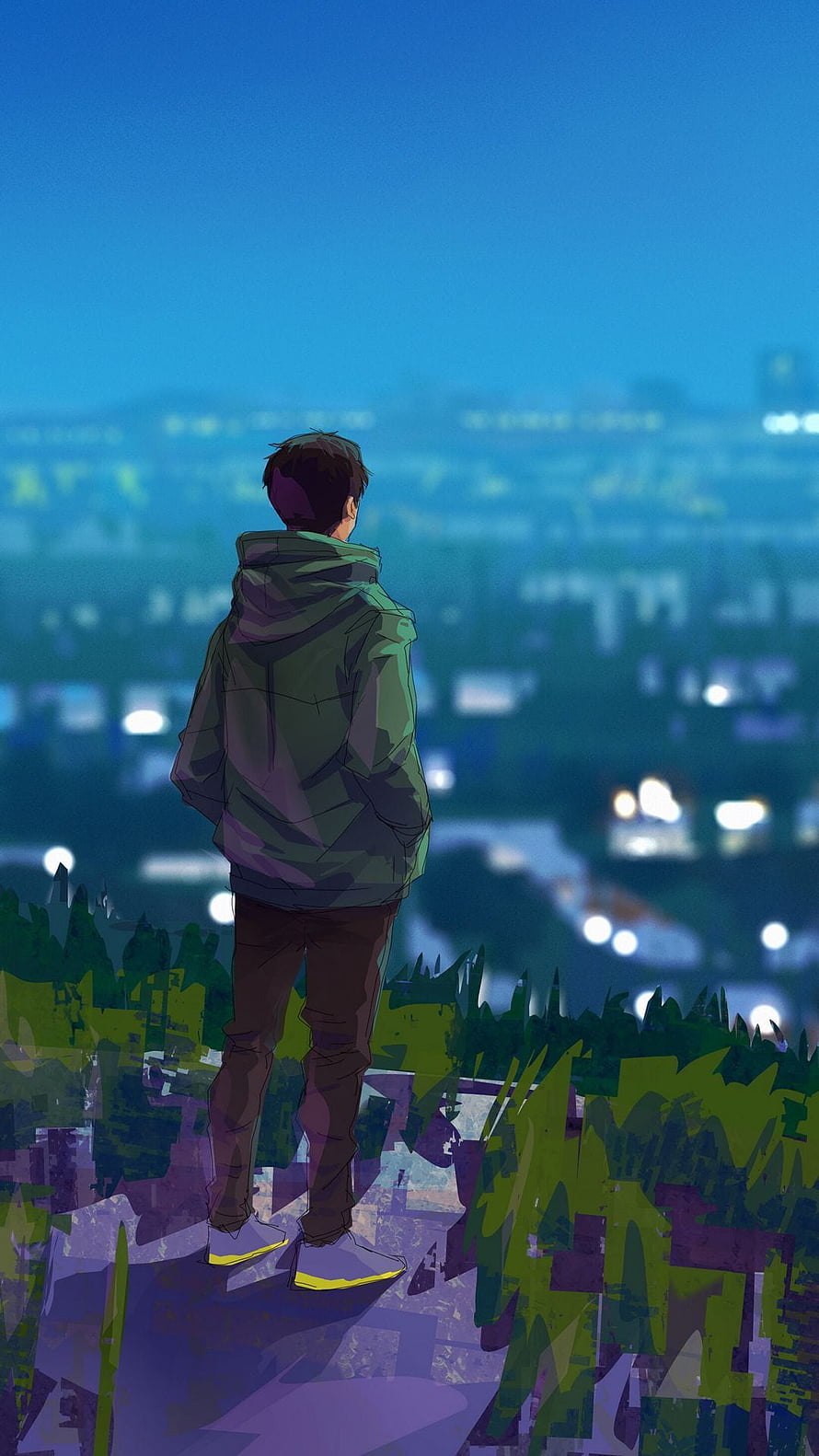 Young man in green hoodie standing on a hill overlooking a city at dusk HD phone wallpaper