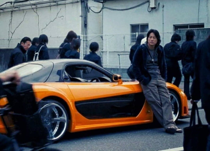 Han Le in the orange Mazda RX-7 from the Fast and Furious franchise HD wallpaper