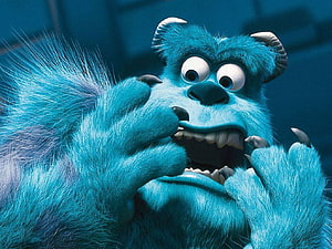 Sullivan from Monsters Inc. in a Close-Up Expression with Furry Blue Fur and Wide Eyes HD wallpaper