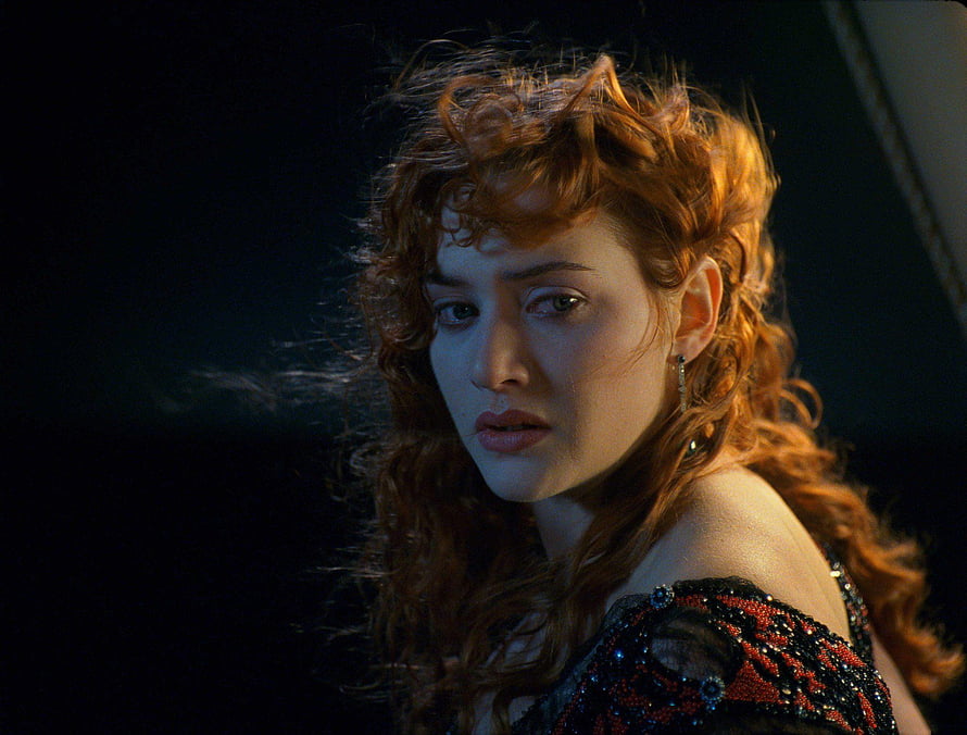 Kate Winslet as Rose in Titanic Dramatic Portrait with Windblown Red Hair HD wallpaper