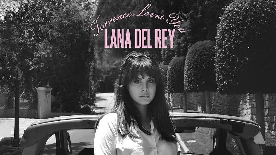 Lana Del Rey in Black and White Portrait with Vintage Convertible Car and Garden Setting HD wallpaper