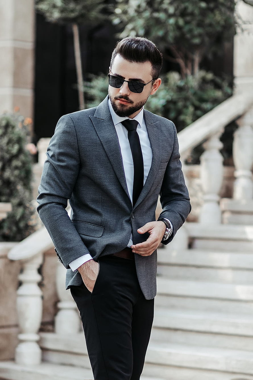 Stylish Man in Grey Suit and Black Tie Wearing Sunglasses on Stone Steps HD phone wallpaper