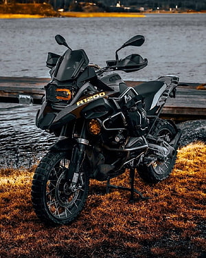 Black BMW R 1200 GS Adventure Motorcycle Parked on Grassy Shoreline HD phone wallpaper