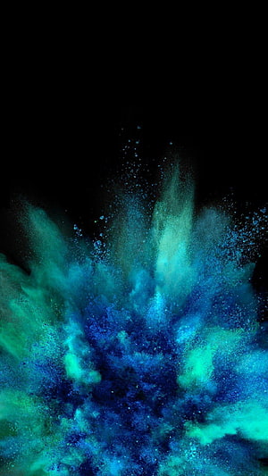 Vibrant Blue and Teal Ink Explosion on Black Background HD phone wallpaper