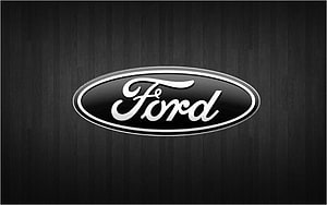 Ford Motor Company Emblem on Dark Wood Grain Background HD wallpaper