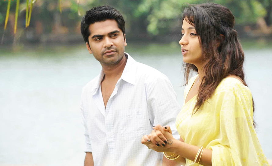Vinnaithaandi Varuvaayaa Movie Still Featuring Manoj and Aishwarya in a Serene Lakeside Scene HD wallpaper