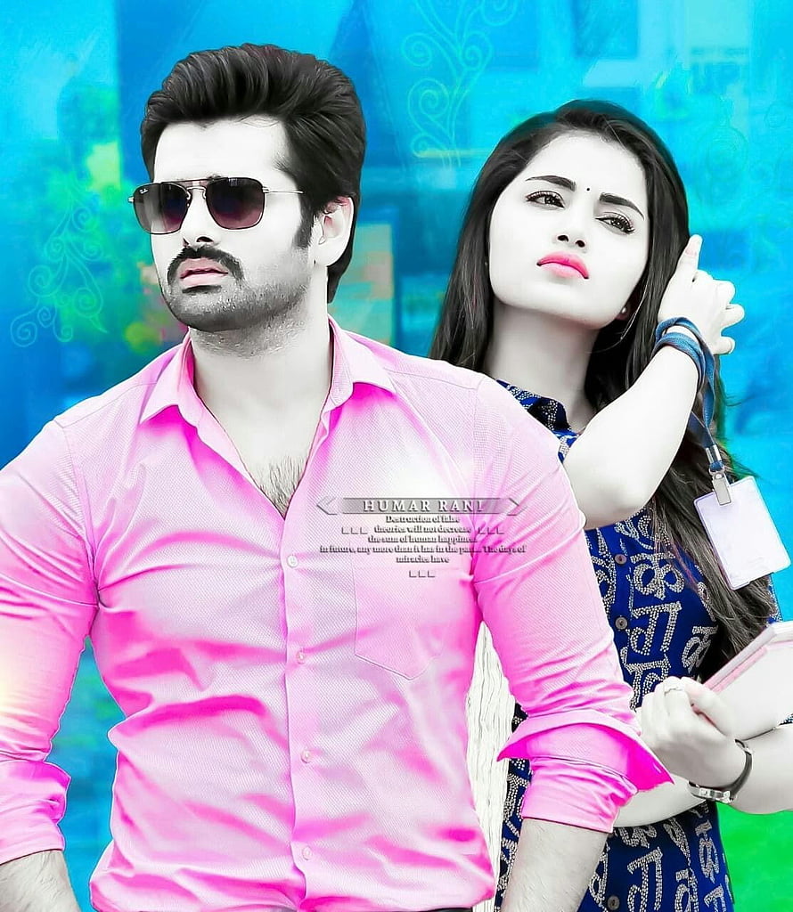 Stylish South Indian couple in vibrant pink and blue attire with sunglasses HD phone wallpaper