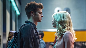 Peter Parker and Gwen Stacy Face to Face in Urban Setting HD wallpaper