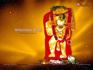 Mehandipur Balaji Temple Deity Adorned in Golden Garments and Flower Garland HD wallpaper