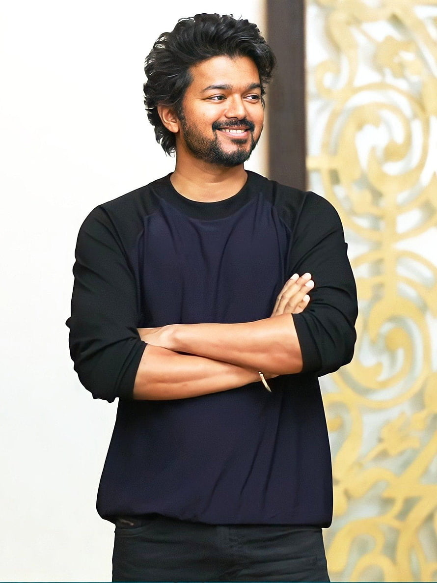 Thalapathy Vijay Smiling Portrait in Black Shirt with Arms Crossed HD phone wallpaper