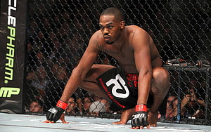 Jon Jones in the UFC Octagon Crouching in Fighting Stance HD wallpaper