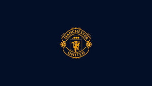Manchester United Club Crest Emblem in Gold on Dark Navy Background HD wallpaper