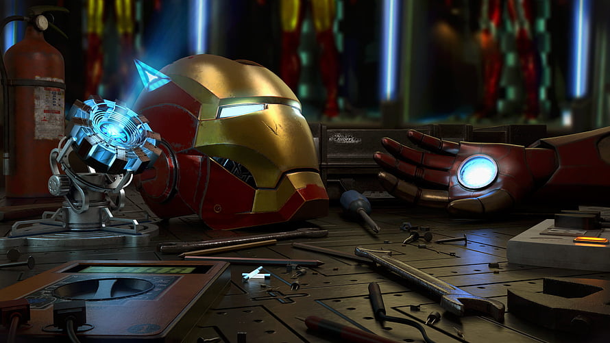 Iron Man Helmet and Arc Reactor on a Cluttered Workshop Bench HD wallpaper