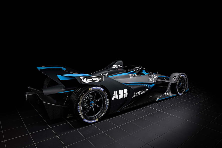 ABB FIA Formula E Gen2 race car with Michelin tires on a dark studio grid HD wallpaper