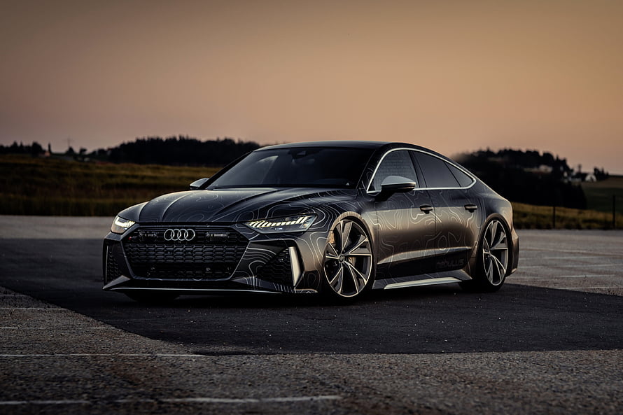 Audi RS7 Ultra Black Sedan on Asphalt at Sunset HD wallpaper