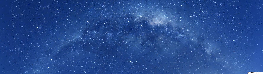 Milky Way Galaxy Spanning a Deep Blue Night Sky with Scattered Stars and Nebulae HD wallpaper