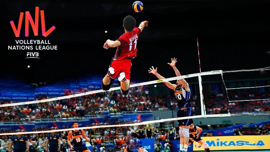 Yuji Nishida Spiking Over the Net in Volleyball Nations League Match HD wallpaper
