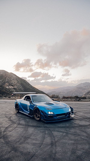 Modified Blue Mazda RX-7 Widebody on Mountain Road at Sunset HD phone wallpaper