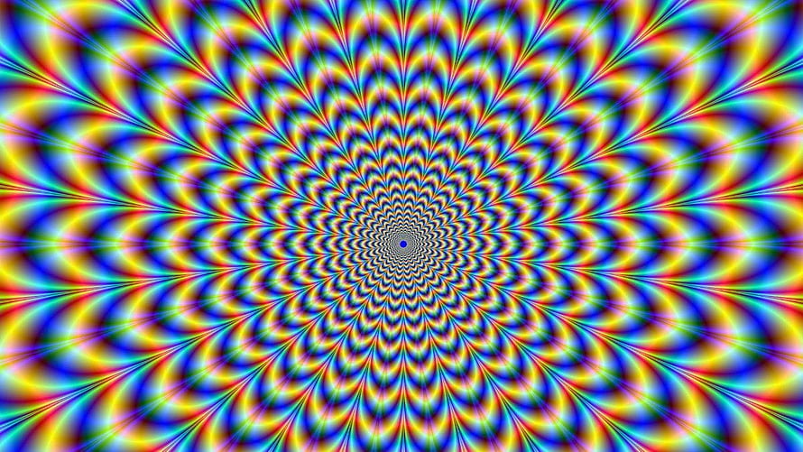 Hypnotic Kaleidoscope Pattern With Radiating Rainbow Colors And Spiral Center HD wallpaper