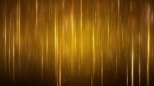 Elegant Golden Vertical Light Streaks with Sparkling Particles on Dark Background HD wallpaper