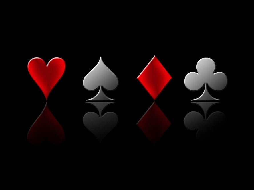 Glossy Playing Card Suits with Reflections on Black Background HD wallpaper