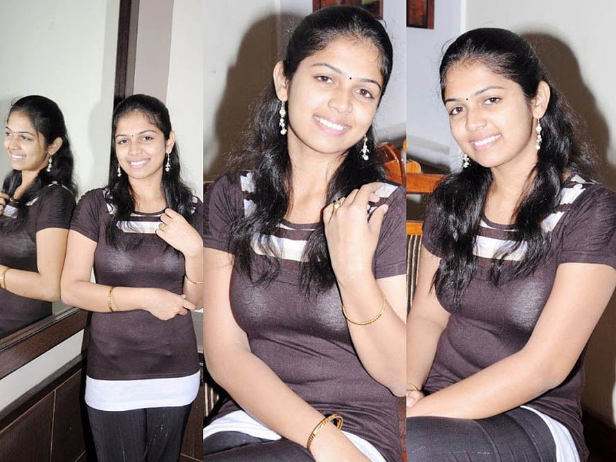 Anjali Nair in a Brown Striped Top and Black Trousers HD wallpaper