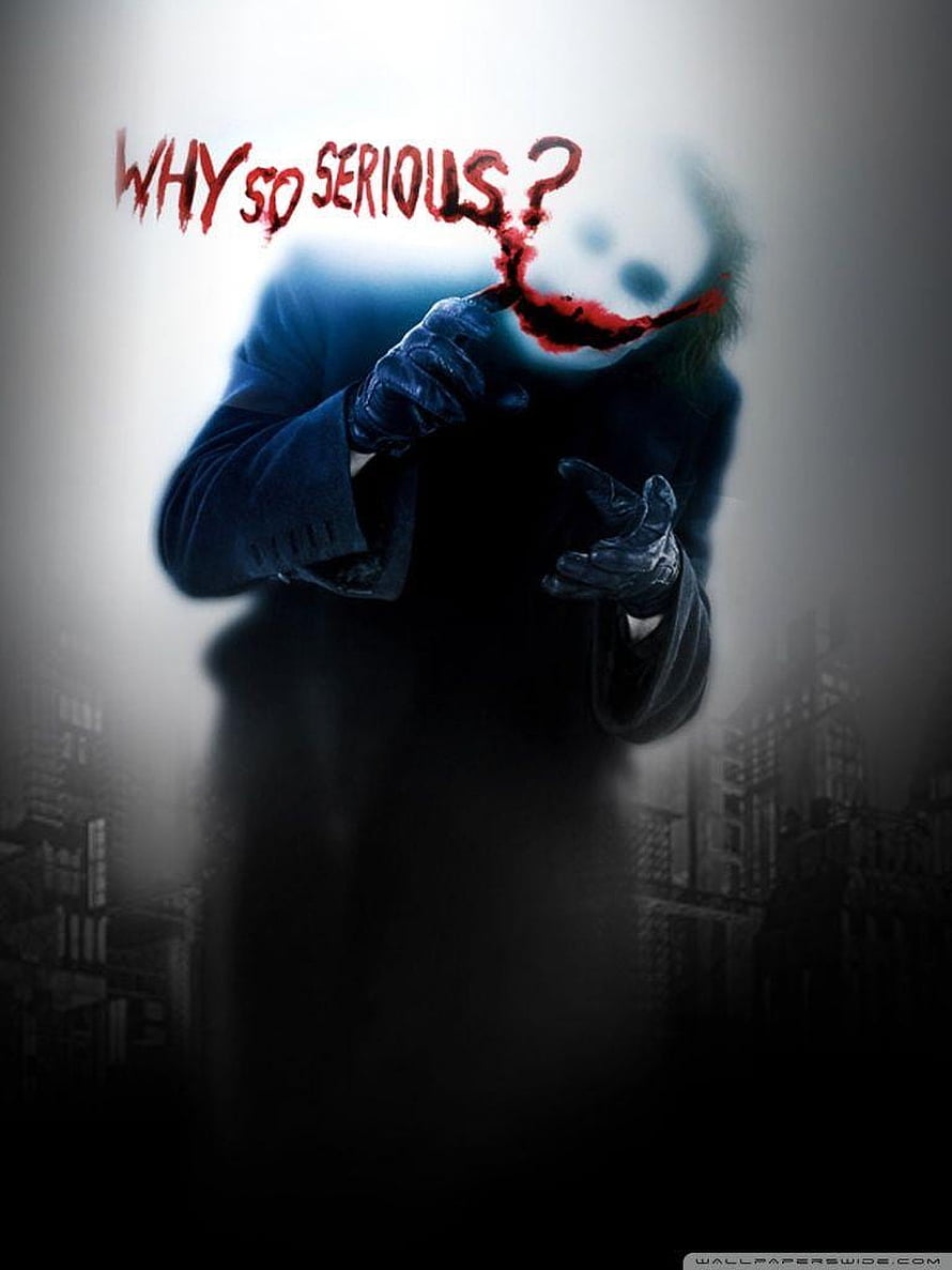 Joker from The Dark Knight Rises in a dark cityscape with the iconic Why So Serious quote HD phone wallpaper