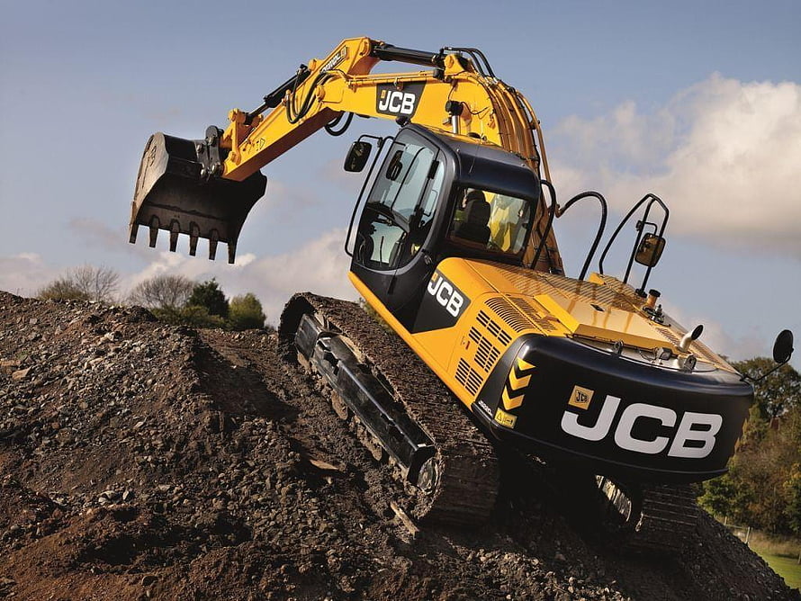 JCB Yellow Crawler Excavator Digging on a Construction Site HD wallpaper