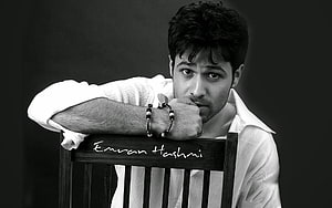 Emraan Hashmi Black and White Portrait Leaning on Wooden Chair HD wallpaper