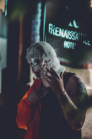 Tattooed Person Wearing Distressed White Ski Mask Smoking Cigarette HD phone wallpaper