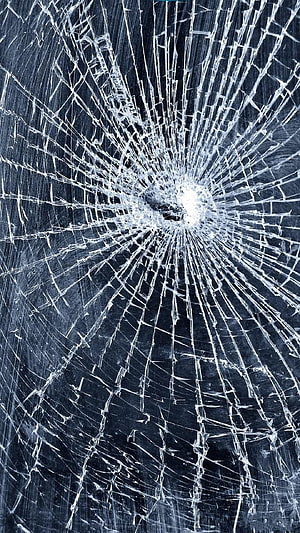 Shattered Glass Texture With Radiating Fracture Lines On Dark Blue Background HD phone wallpaper