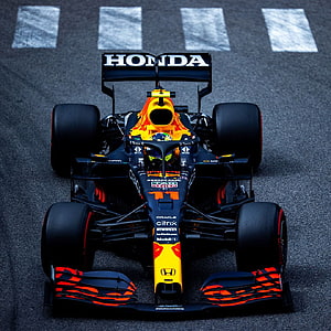 Checo Perez Red Bull Racing Formula 1 Car Front View on Track HD phone wallpaper