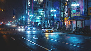 Rainy Night Street Scene in Japan with Neon Signs and Wet Asphalt HD wallpaper