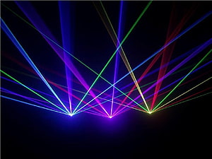 Vibrant multicolored laser beams radiating from three points against a dark background HD wallpaper