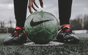 Nike Soccer Ball and Cleats on Grass Field Close-Up HD wallpaper