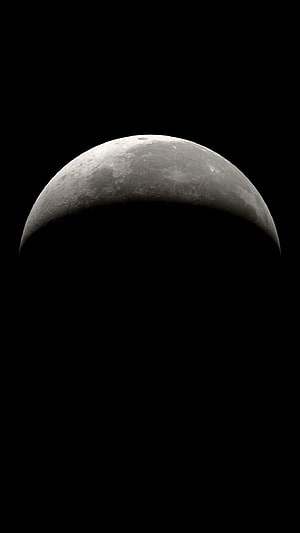 Gibbous Moon Phase Against Deep Black Sky HD phone wallpaper