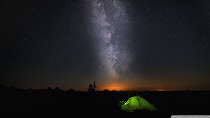 Glowing Green Tent Under the Milky Way Galaxy in a Starry Night Sky HD wallpaper