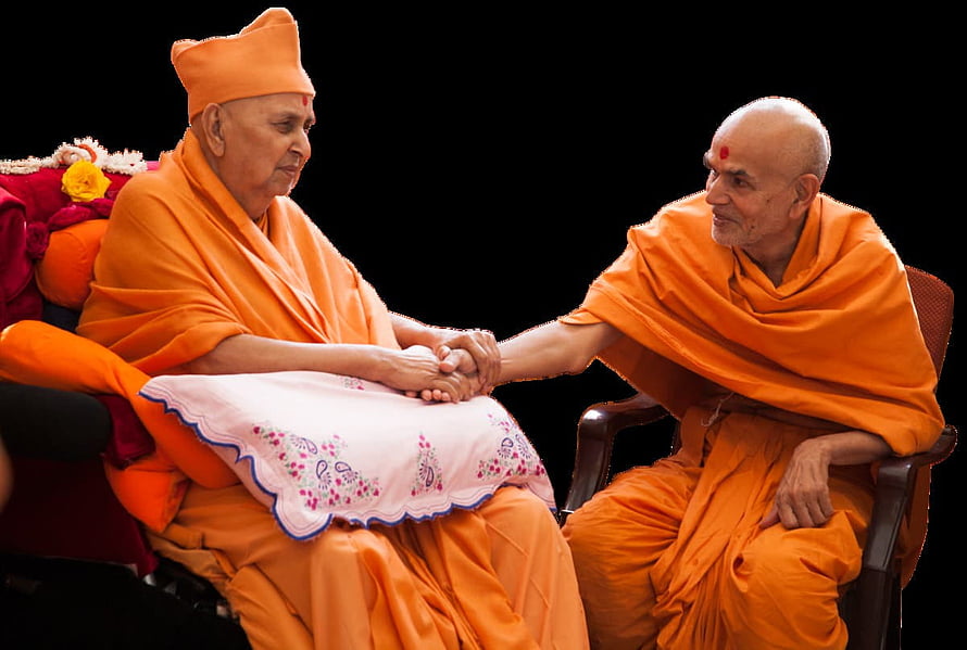 BAPS Mahant Swami Maharaj and Senior Swami Sharing a Warm Handshake in Saffron Robes HD wallpaper