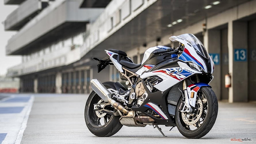 BMW S1000RR Sportbike in M Motorsport Livery Parked at a Race Track Pit Lane HD wallpaper