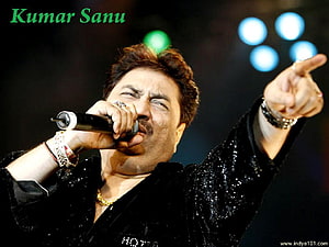 Kumar Sanu Live Concert Performance in Black Sequined Jacket HD wallpaper