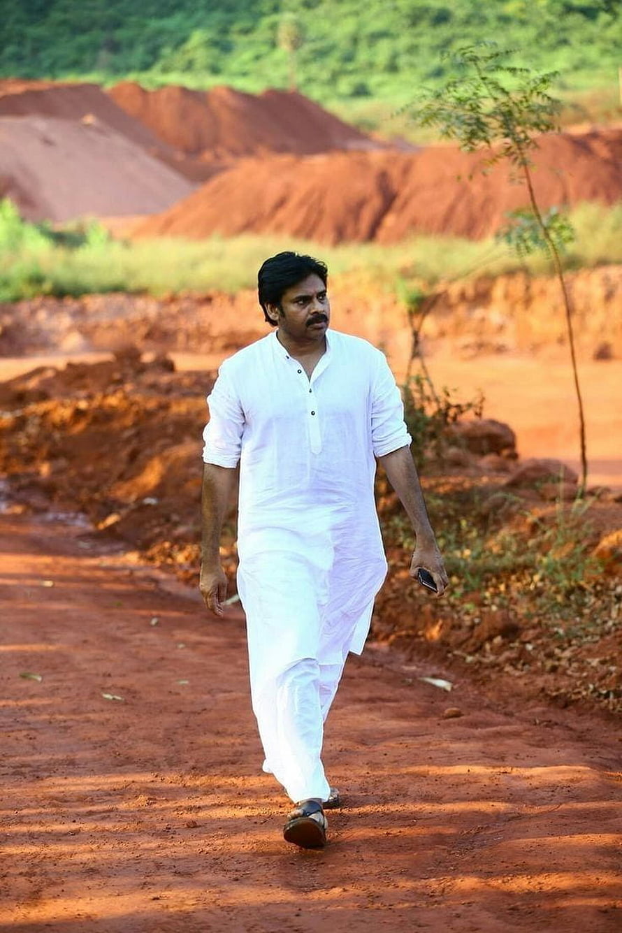 A R U N Z Walking on a Red Dirt Path in Traditional White Attire HD phone wallpaper