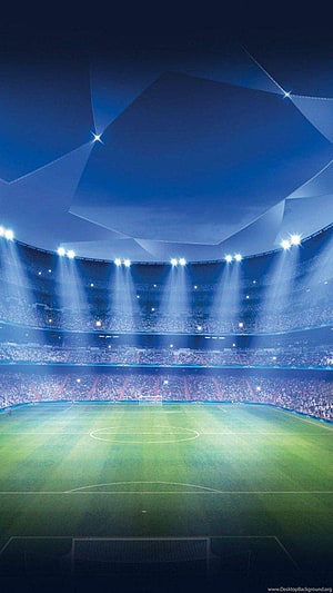 Illuminated Soccer Stadium at Night with Floodlights and Full Crowd HD phone wallpaper