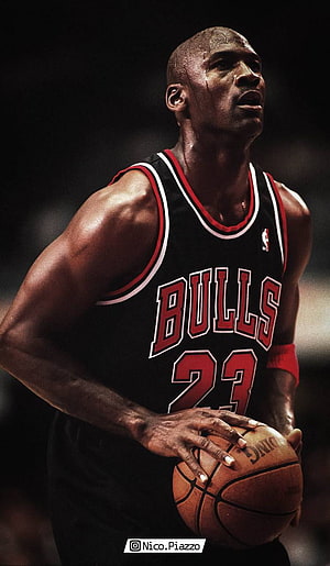 Michael Jordan in Chicago Bulls Black Jersey Holding Basketball HD phone wallpaper