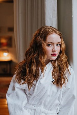 Sadie Sink in a White Bathrobe with Long Wavy Red Hair and Freckles HD phone wallpaper