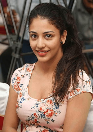 South Indian Actress in Floral Top with Long Dark Hair HD phone wallpaper